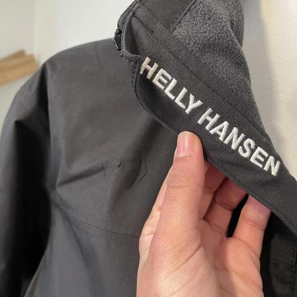 Black Helly Hansen waterproof jacket with hood size large - Picture 3 of 8